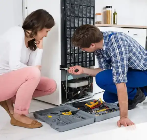 Our technician is fixing Fridge