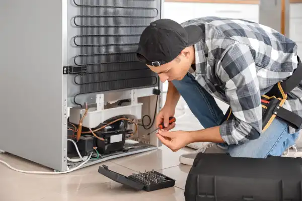 Our technician is fixing Freezer
